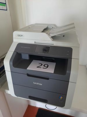 a printer that is sitting on top of a desk