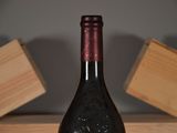 a bottle of wine that is sitting on a table