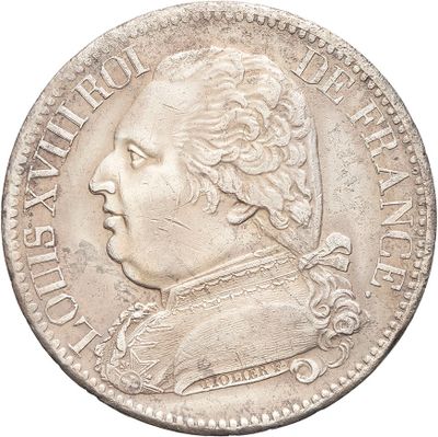gros plan d'une pièce de monnaie sur fond blanc