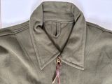 a close up of a jacket with a zipper on it