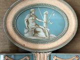 a clock with a picture of a man on it