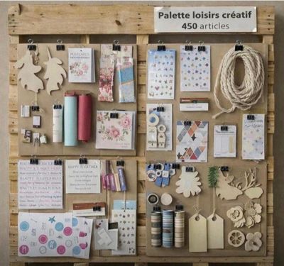 a picture of a bulletin board with lots of craft supplies on it