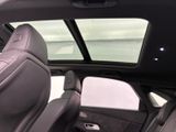 a view of the inside of a car from the driver ' s seat