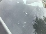 a car that has a broken windshield and a broken windshield