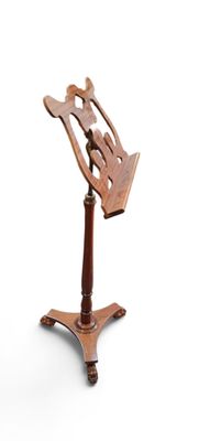 a wooden music stand with a musical instrument on it