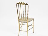 an image of a gold chair with a marble seat on a white background