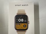 packaging of a smart watch on a table with a box