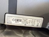 a label on a machine that is sitting on a table