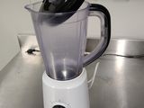 a blender sitting on a counter in a kitchen