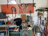 a garage with a lot of tools on the shelves