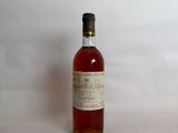 a bottle of liquor sitting on a table