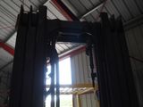 a picture of a fork lift in a warehouse