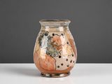 a small vase that is sitting on a table