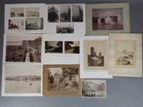 an assortment of old photographs of people and buildings on a wall