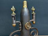 a wine bottle shaped like a fire hydrant on a table