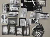 several black and white photographs of a bunch of people on a table