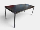 an image of a table with a black top and metal legs