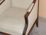 a chair that is sitting in the corner of a room