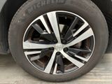 a close up view of a tire on a car