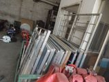 a lot of different types of windows in a warehouse