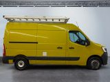 a yellow van that is parked in a garage