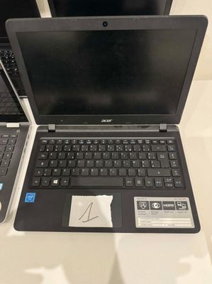 two laptops that are sitting on a table