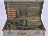 an old suitcase with a bunch of tools inside of it