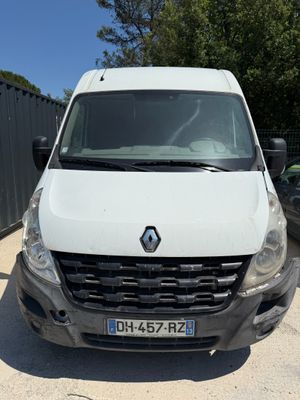 the front of a white van parked in a parking lot