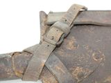 an old leather bag with a metal buckle on it