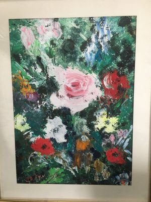 une peinture à l'huile représentant un bouquet de fleurs dans un cadre doré