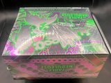 a close up of a box with a dragon on it on a table