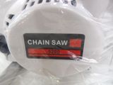 a chain saw in a plastic bag on a table