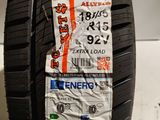 a close up of a car tire with a lot of stickers on it