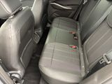 the back seats of a car are empty and the seats are empty