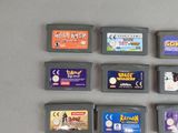 a lot of nintendo game cartridges sitting on a table