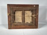 an old wooden picture frame with a number 10 on it