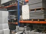 a large amount of boxes and pallets in a warehouse