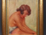 a painting of a woman sitting on the ground in a gold frame
