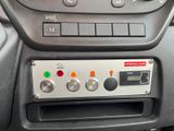 a control panel on the dashboard of a car