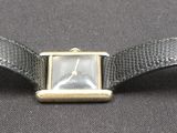a watch that is sitting on top of a table