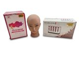 a mannequin head next to a box of condoms