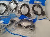 many different types of cables wrapped in plastic bags