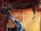 a robot that is sitting on a table in a room