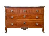 a wooden dresser with many drawers and knobs on it