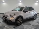 the white fiat suv is parked on a checkered floor