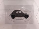 a small black car in a clear display case