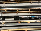 a stack of pallets stacked on top of each other in a warehouse