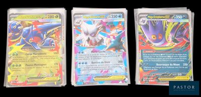 three different pokemon cards in plastic bags on a black background