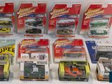 a lot of toy cars that are in the package
