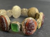 an image of a close up of a bracelet on a table